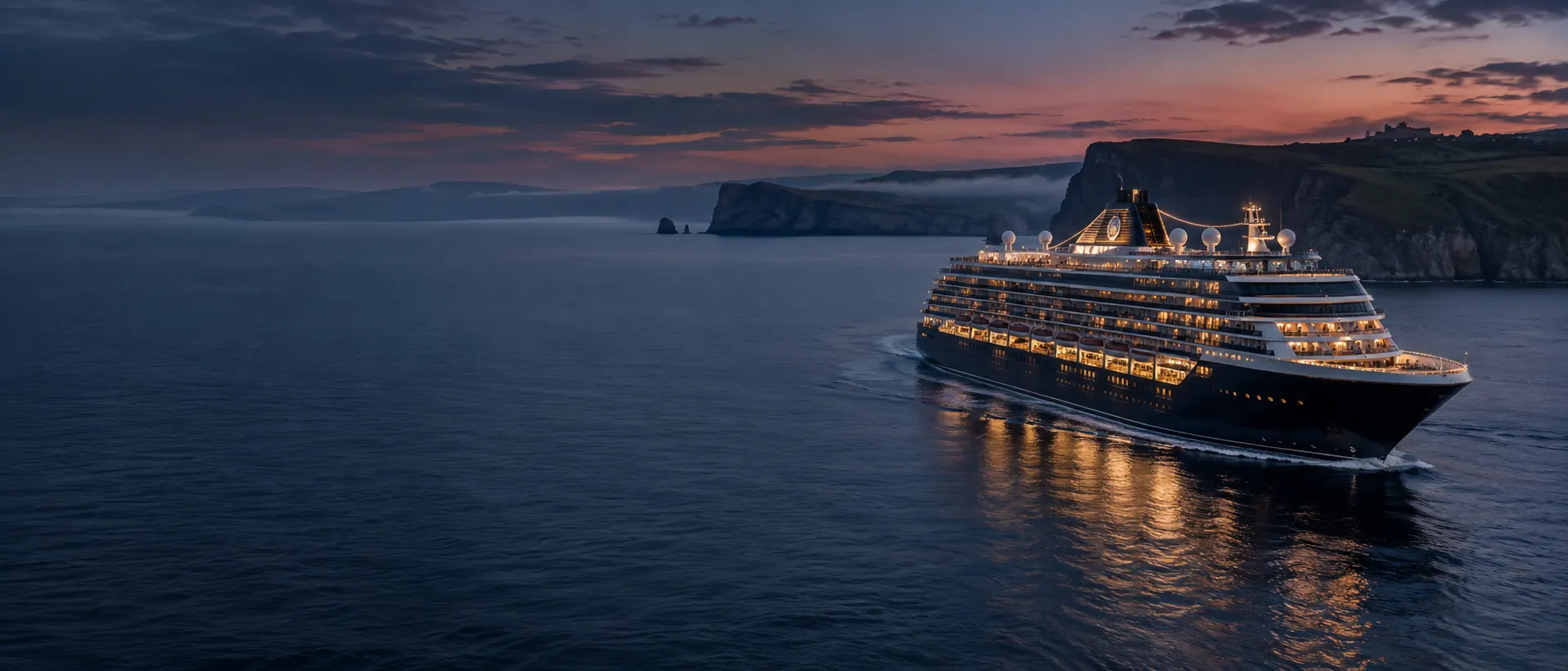 Contemporary cruise liner sailing beside British coastal cliffs at blue hour